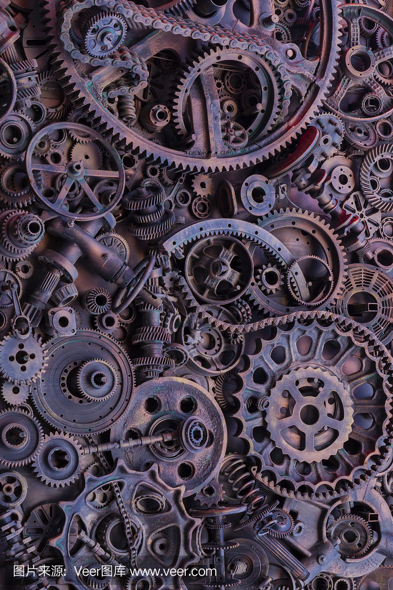 蒸汽朋克背景,机器零件,大齿轮和链条的机器和拖拉机。陈旧生锈的机器和机械部件。弹簧、轴承、活塞、曲轴、凸轮轴。